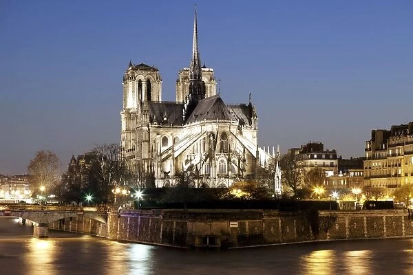 Notre Dame cathedral and River Seine at night, Paris, Ile de France, France, Europe
