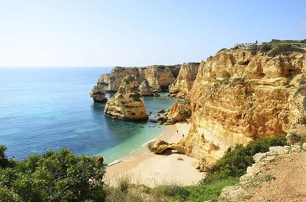 The coastal rock formations at Marinha beach (Praia da Marinha). Algarve, Portugal