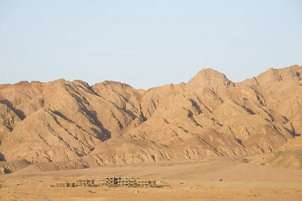 Mountains of the Sinai desert near Dahab in Egypt. Temperatures have already risen by 0. 7 degrees celcius in the last 100 years making an already hot and dry area even more so. This desert area is likely to spread across the Mediteranean basin