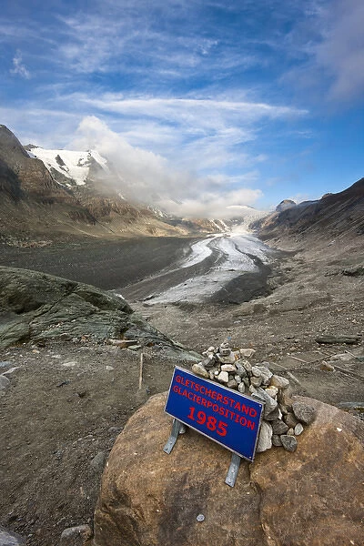 Retreat of Glacier Pasterze of Mount Grossglockner with a sign showing the glacier position 1985