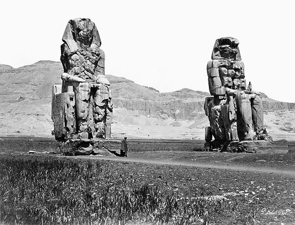 EGYPT: COLOSSI OF MEMNON. The two seated sandstone statues of the Pharaoh Amenhotep III