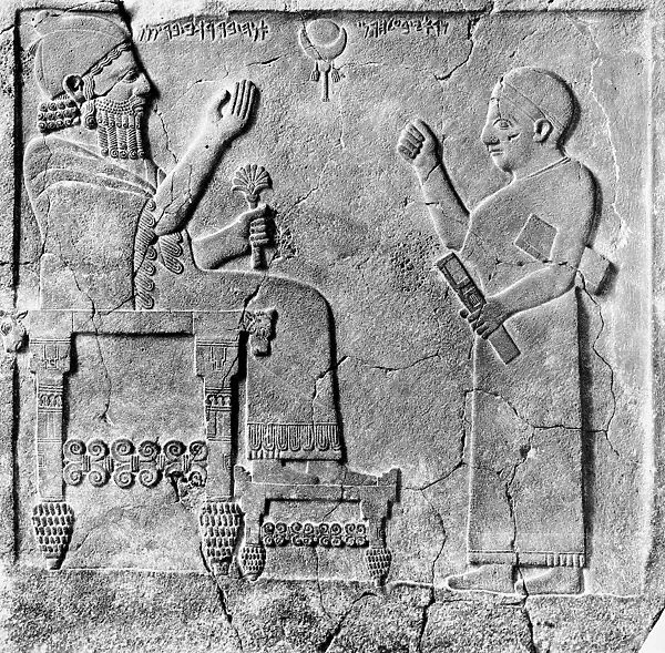 HITTITE RELIEF. Aramean King Barrekup and his scribe. Orthostat relief from Sam al. Basalt, 8th century B. C