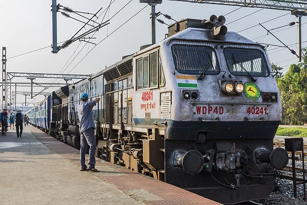 A locomotive ready to haul a passenger train on the Indian Railways. This is at Kochi in Kerala, India