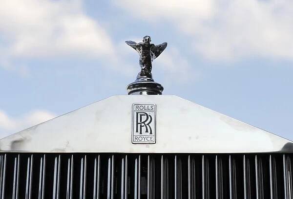 An original hood ornament adorns the grill of a 1952 Rolls Royce during an antique