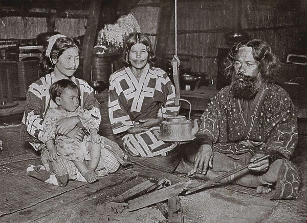 Ainu Man and Women at Home (b  /  w photo)