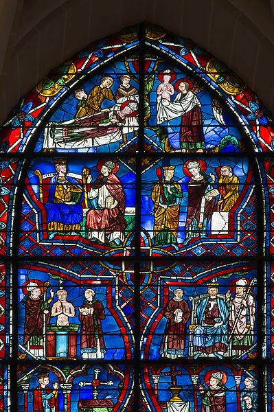 Stained glass of the cathedral of chartres; detail of the life of saint remi