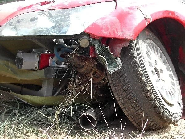 FIA World Rally Championship: The Citroen C4 WRC of Sebastien Loeb after they retired on Stage 13 with broken front suspension