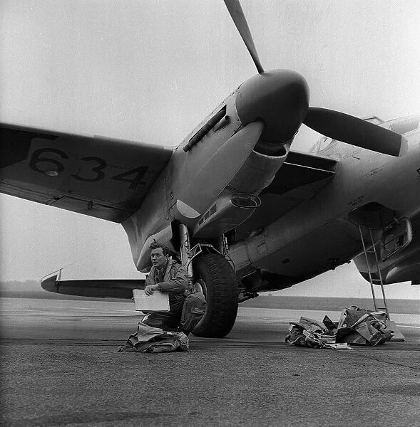 Aircraft De Havilland DH98 Mosquito TA634 - Flying Officer Kirkham fills in his flying