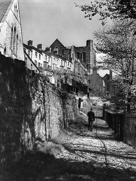 Man walking along the path by Bangor University. April 1949