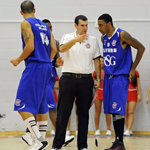 Bristol Flyers Basketball: Head Coach Andreas Kapoulas Consults with Doug Herring During Game Against Plymouth Raiders
