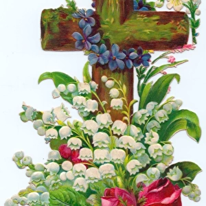 Assorted flowers on a cross-shaped greetings card