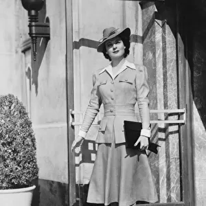 Ruth Hussey modelling a suit ensemble designed by Dolly Tree