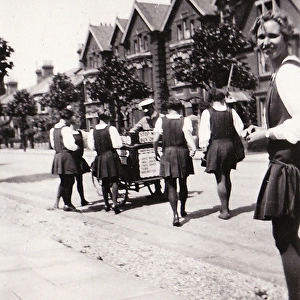 Students and ice cream seller in Warwick Avenue possibly