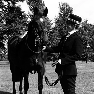Woman police officer with her horse, London
