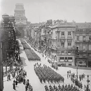 World War II Allied trrops march rue de Regence in Brussels