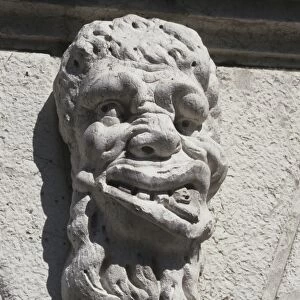 Sculpture of a deformed human head
