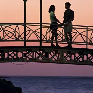 Couple on bridge, Aruba, West Indies, Dutch Caribbean, Central America