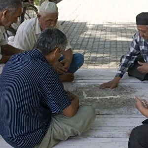 Men playing dominos, Bokhara, Uzbekistan, Central Asia, Asia