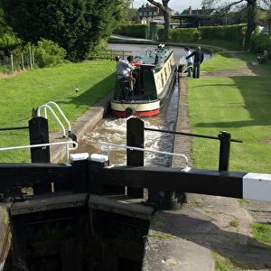 Narrow boat on the Llangollen Canal going through the locks at Grindley Brook