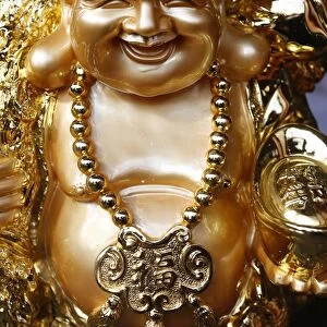 Statue of Ong Dia, the round happy God of the Earth who symbolizes prosperity, Paris, France, Europe