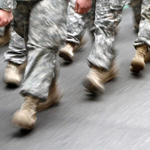 US army soldiers are seen marching in the St. Patricks Day Parade in New York