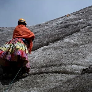 The Wider Image: Bolivias cholita climbers