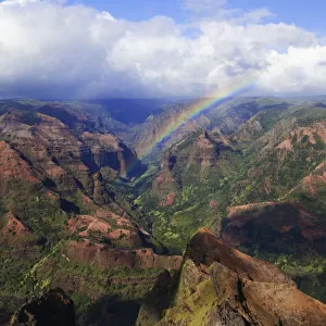 USA, Hawaii, Kauai. Rainbow over Waimea Canyon