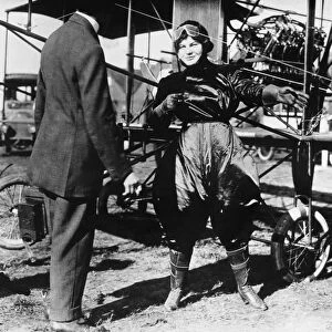 Blanche Stuart Scott. American aviator. Photographed in front of her biplane, 1910
