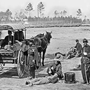 CIVIL WAR: AMBULANCE, 1864. Zouave ambulance crew at the headquarters of the Army