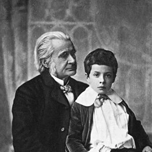 THOMAS H. HUXLEY (1825-1895). English biologist. Huxley with his grandson, Julian Huxley