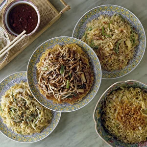 Deep-fried bean paste sauce with noodles, tossed noodles with ginger and spring onions, double-faced brown rice noodles with pork, dry-braised Yi noodles, and Singapore fried rice sticks