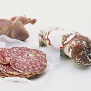 France, sliced meat, whole raw chicken and packaged saucisson