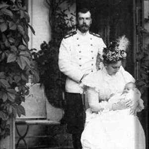 The royal couple of russia, tsar nicholas ll and tsarina alexandra fyodorovna with child