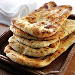 Indian naan bread with garlic and coriander
