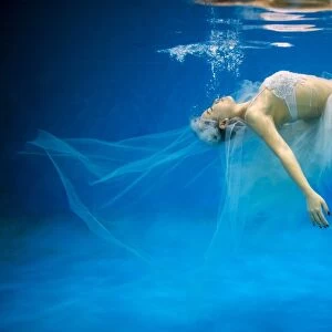 Chinese Bride-To-Be Posing Underwater