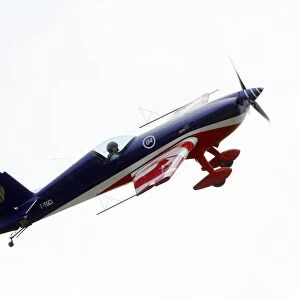 Fighter pilot and aerobatic, Captain Pierre Varloteaux performs in his Extra 330
