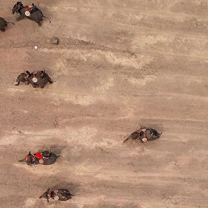 Mahouts Racing Their Elephants