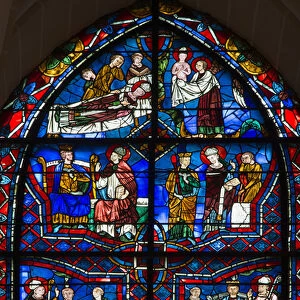 Stained glass of the cathedral of chartres; detail of the life of saint remi