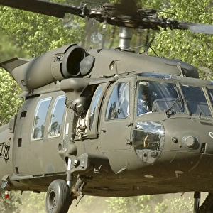 U. S. Soldiers conduct an air assault mission in an UH-60M Black Hawk