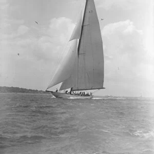 The 23-metre cutter Astra sailing close-hauled, 1933. Creator: Kirk & Sons of Cowes