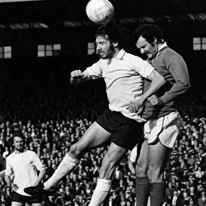 Bolton centre forward Roy Greaves and Rochdale centre half Arthur Marsh in a heading duel