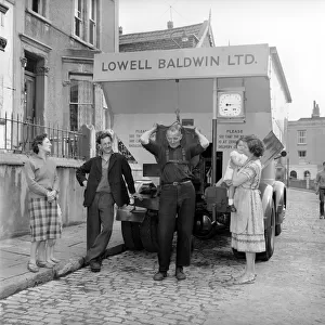 Bristol coal delivery, coal man weighs out delivery. Circa 1957