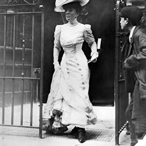 Fashion 1908: Madam Gould leaving 9 Soho Square after wedding followed by her husband