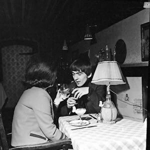 George Harrison out on a date with "a friend of the family", London