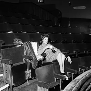 Julie Andrews watches her husband working on stage at the Lyric Theatre, Hammersmith