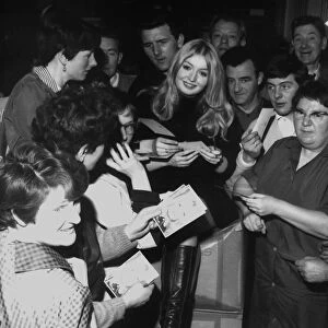 Mary Hopkin welsh singer Feb 1969 signing photographs of herself in Dundee