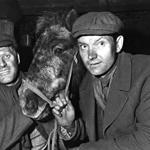 Two miners crom County Durham with Lion, one of the pit ponies appearing the new Disney