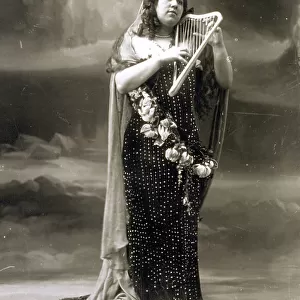 Full-length portrait of the singer Eugenia Burzio in stage costume designed for the performance of the Romantic opera Loreley