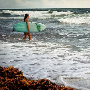 Florida, Boca Raton, surfer on beach