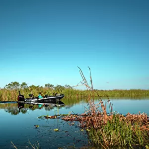 Florida, Everglades, fisherman in small boat